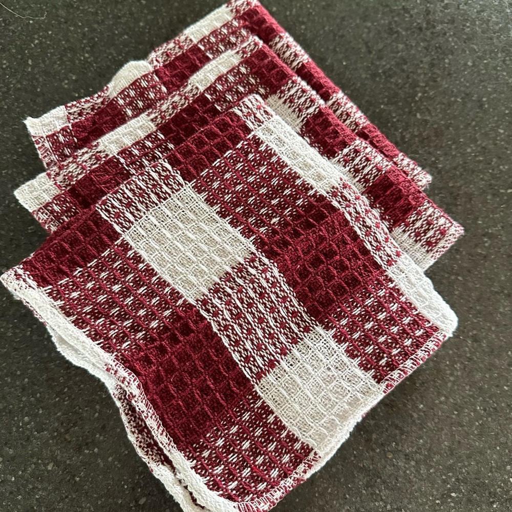 Three brand new kitchen towels measuring 12”x12” square